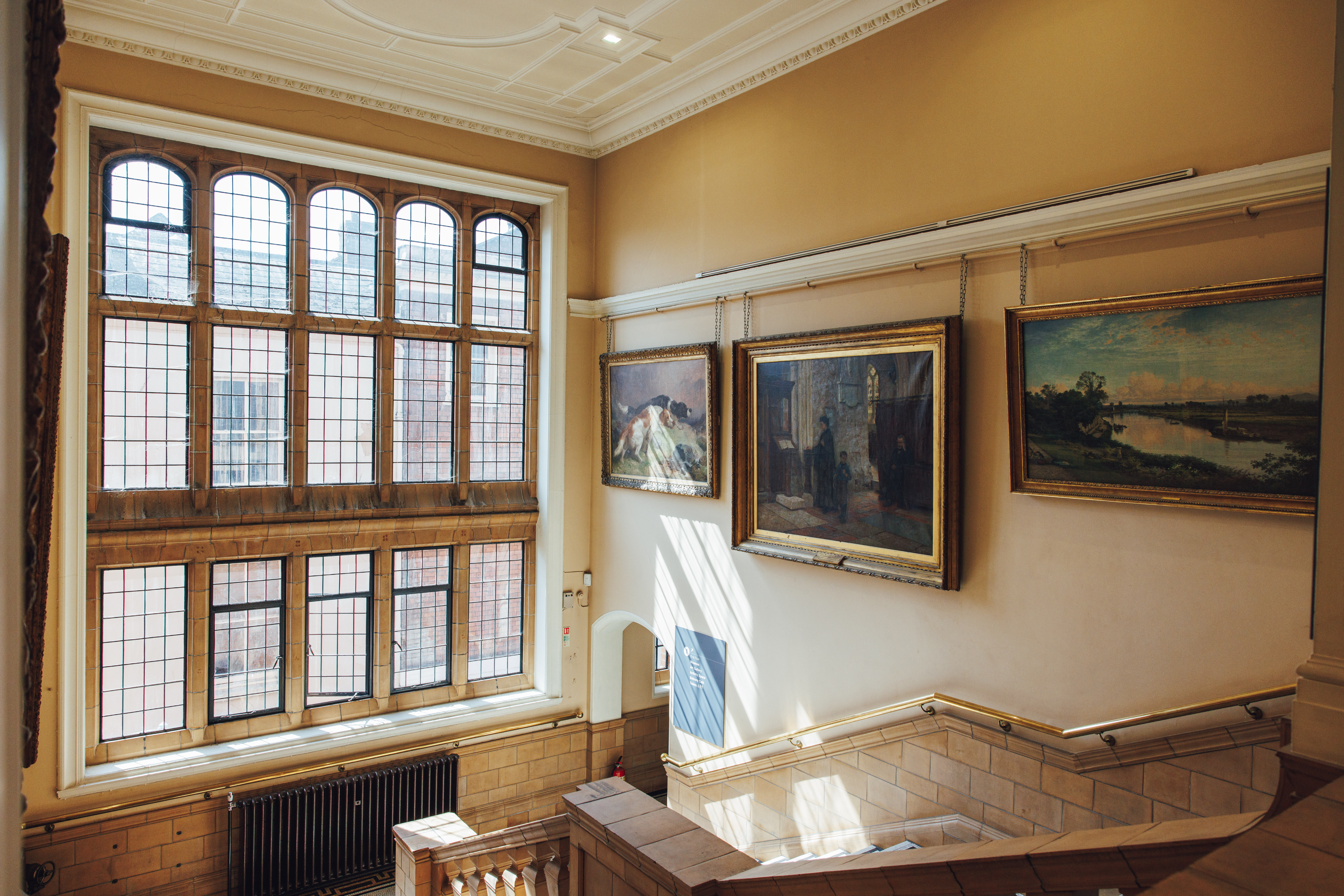 4G1A7435 A photo showing artworks on the staircase at Worcester City Art Gallery and Museum.